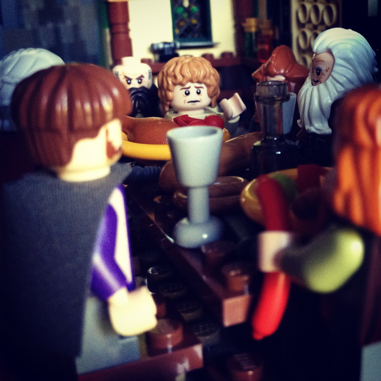 LegoGenre 00215: “He got up trembling. He had less than half a mind to fetch the lamp, and more than half a mind to pretend to, and go and hide behind the beer-barrels in the cellar, and not come out again until all the dwarves had gone away.”